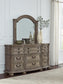 Ardenfield King Upholstered Sleigh Bed with Mirrored Dresser